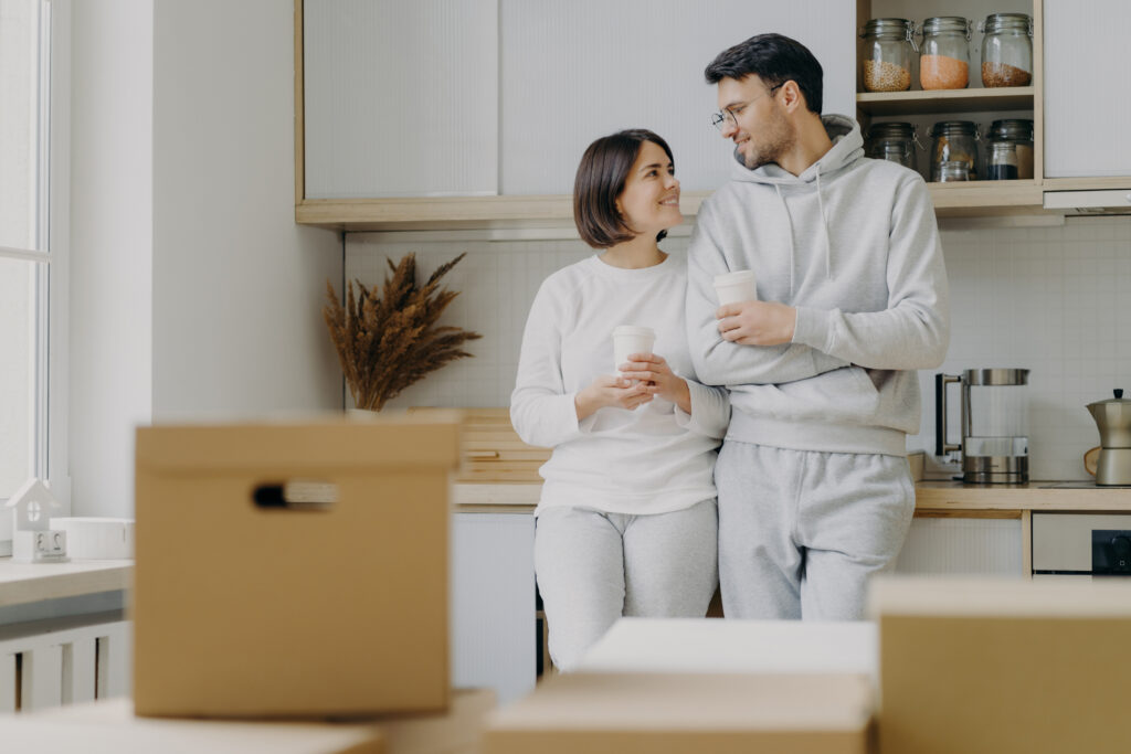 couple talking in kitchen