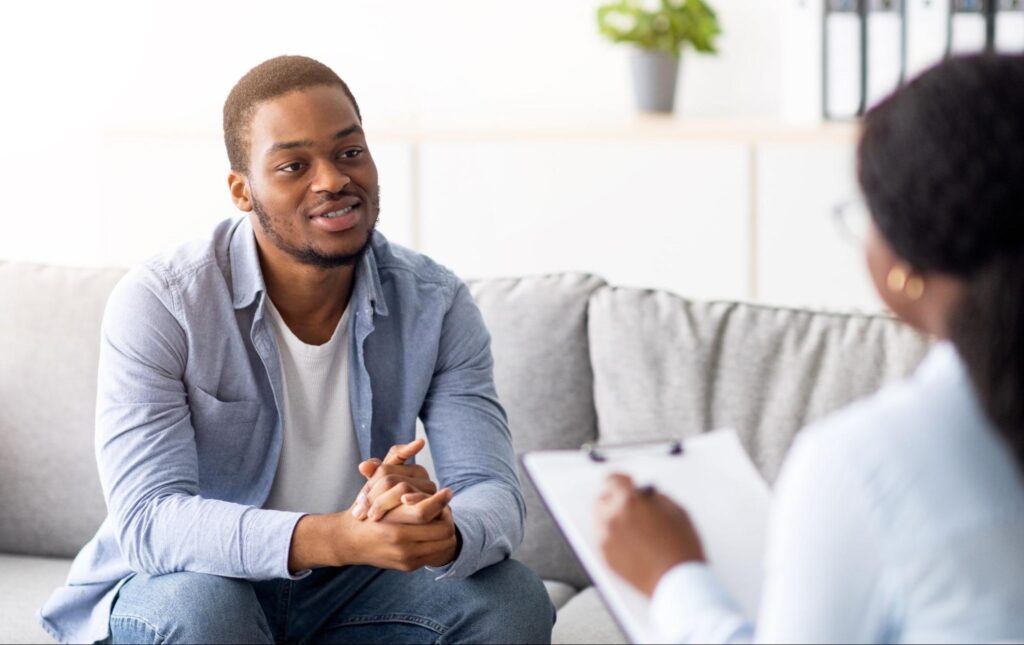 man talking to therapist