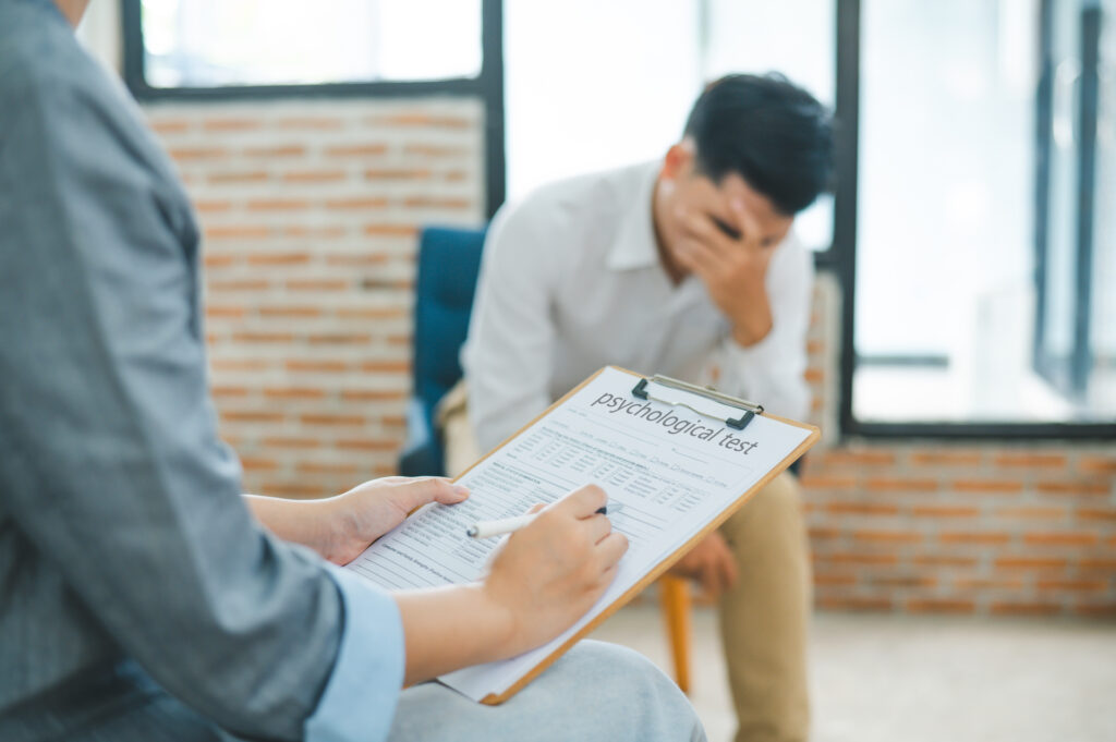 Psychologist listening to the problem of a patient with mental health issues